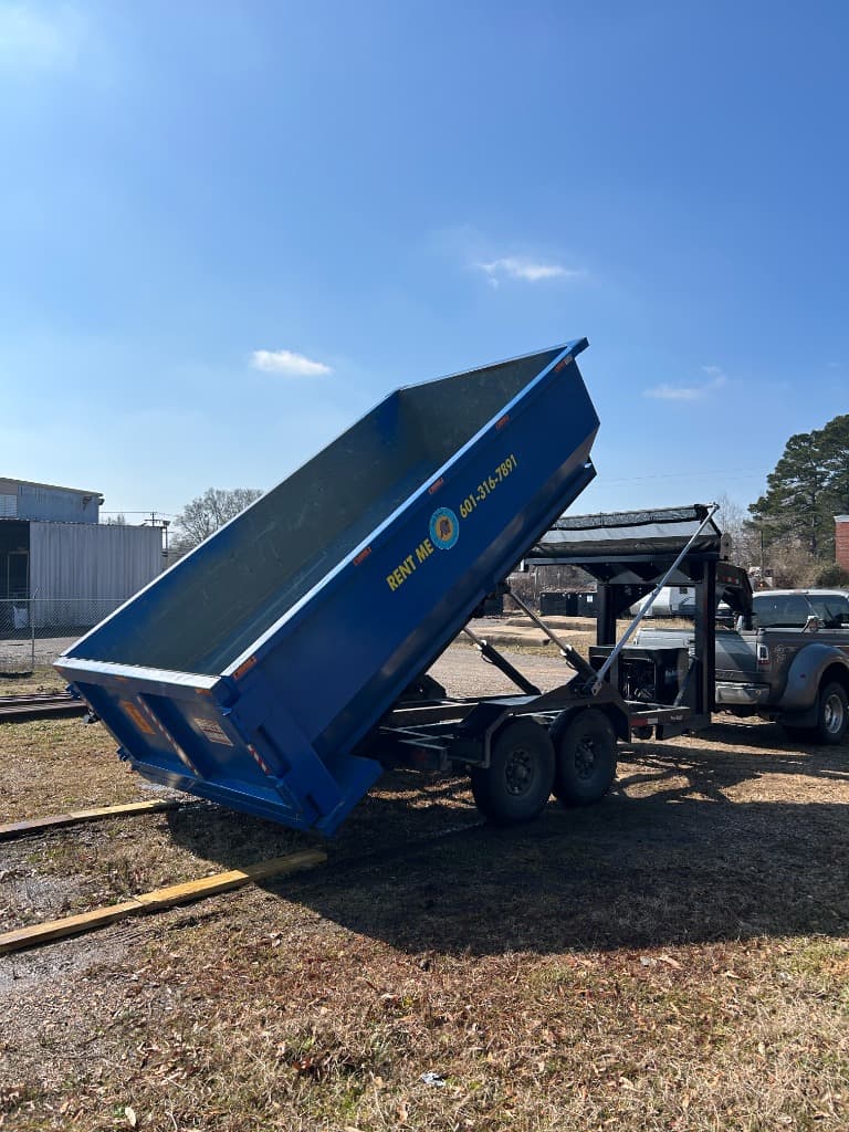 Commercial roll-off dumpster placed at a business property in Jackson, Mississippi