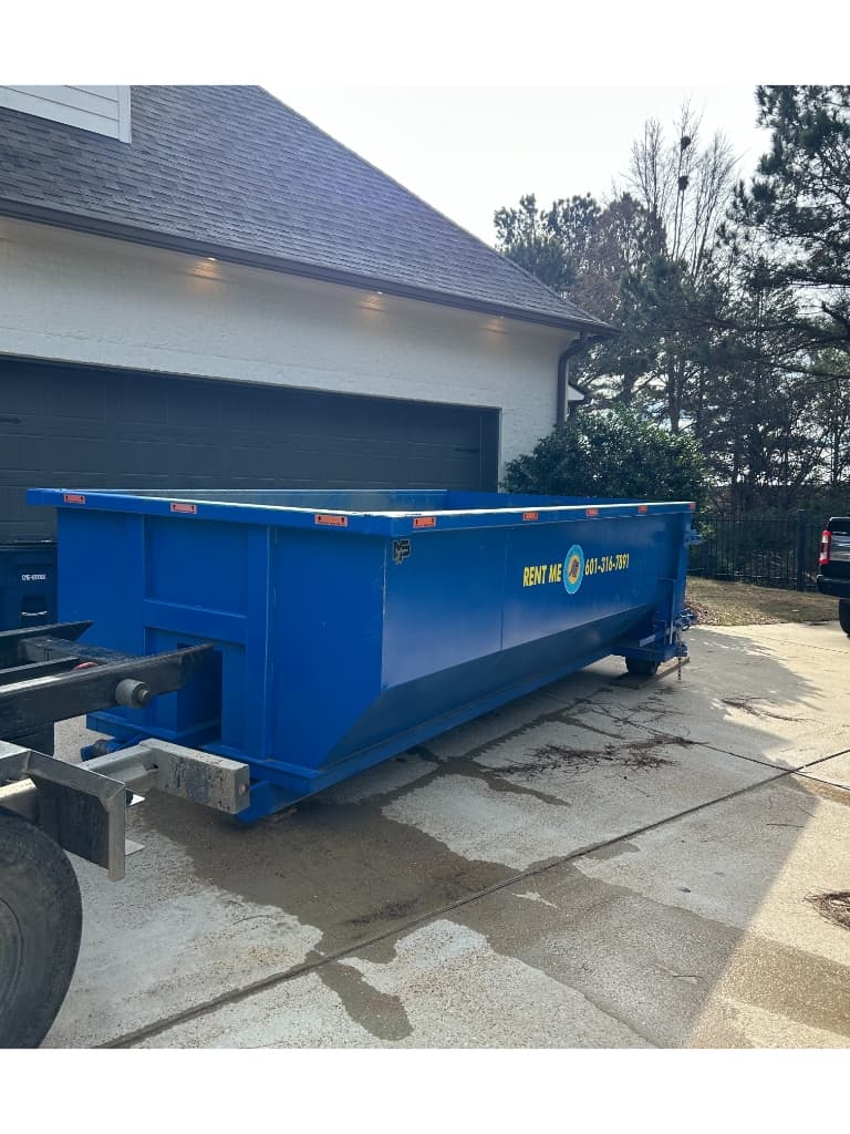 Mid South Dumpster Rentals clean 20-yard roll-off container delivered to a residential driveway in Madison, Mississippi (Madison County) — serving Reunion, Lake Caroline, Annandale & Old Canton Road corridor